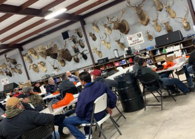 teams sitting at table